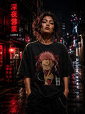 Drip&Verse black 100% cotton oversized graphic tee with a red and white anime demon print on the front. Model is wearing size M.