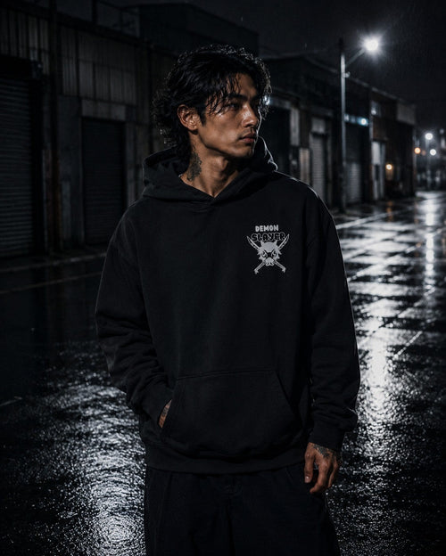 Drip&Verse Beast Blade dark edition black heavyweight boxy fleece hoodie with chest emblem and kangaroo pocket, worn by a male model.