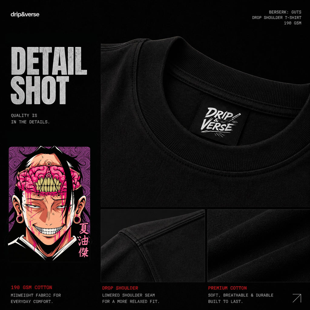 Drip&Verse black 100% cotton oversized drop shoulder t-shirt with horror art graphic of a grinning character with exposed brain.