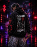 Drip&Verse black heavyweight fleece hoodie with manga panel art on back and red tribal print on sleeves. Model wears size M.