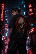 Drip&Verse black oversized cotton t-shirt with back print of a demon face with flames and orange orbs.