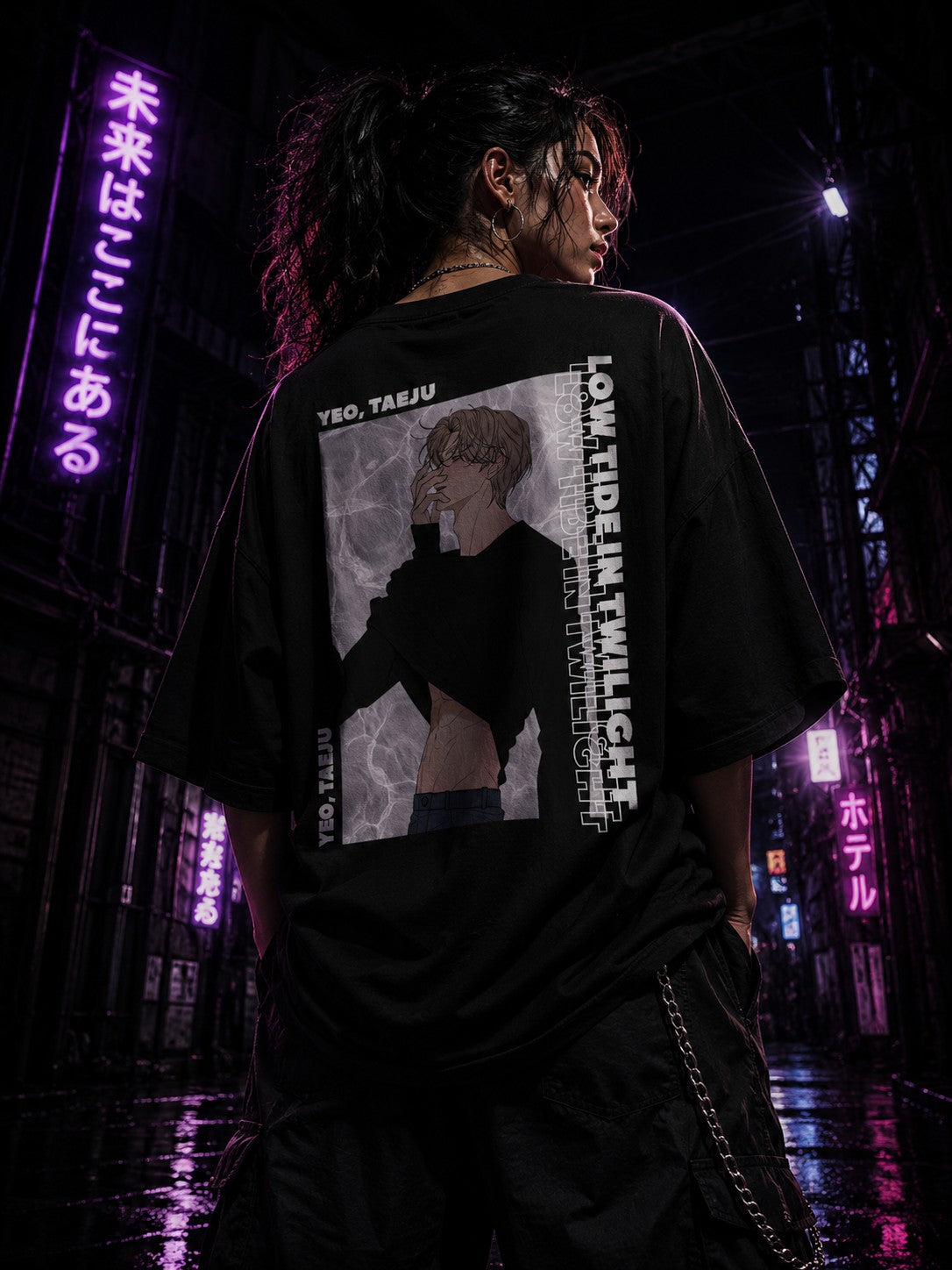 Drip&Verse black oversized 100% cotton tee with a graphic print of a man and vertical text "LOW TIDE IN TWILIGHT".