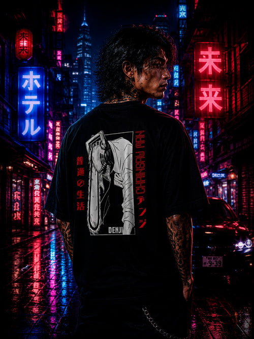 Drip&Verse black oversized 100% cotton t-shirt with Chainsaw Man anime art and Japanese text. Model is 5'11" wearing size M.