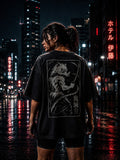 Drip&Verse black 100% cotton oversized t-shirt with drop shoulder and anime-inspired ink art graphic on back.