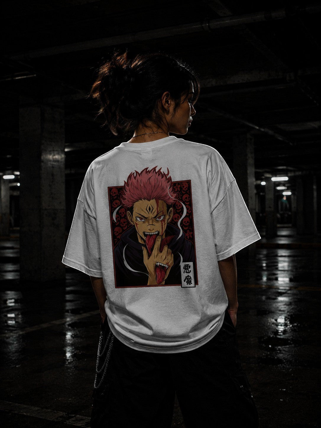 Drip&Verse white 100% cotton oversized graphic tee with a red skull background and a character with pink hair, red eyes, and blood dripping.